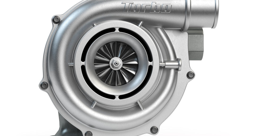 A standard car turbocharger with a visible turbine wheel, smooth metallic housing, and engravings on the top intake section.